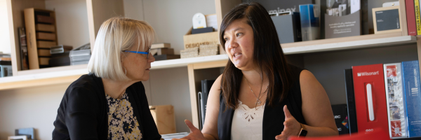 A person talking to another personAI-generated content may be incorrect.