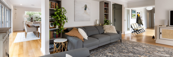 A couch in a roomAI-generated content may be incorrect.